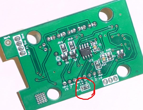 The bottom side of the board. The terminating resistor is circled in red